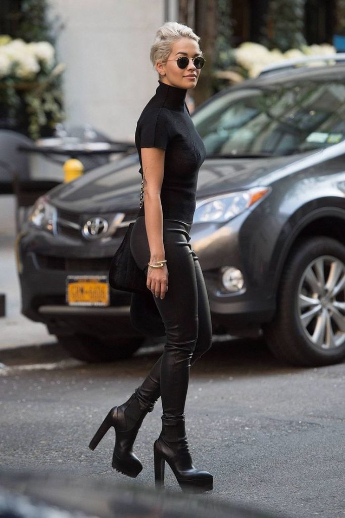 Rita Ora wears black short sleeved turtleneck
